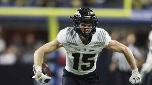 Dec 3, 2022; Indianapolis, Indiana, USA; Purdue Boilermakers wide receiver Charlie Jones (15) reacts after a long reception during the first half of the Big Ten Championship against the Michigan Wolverines at Lucas Oil Stadium. Mandatory Credit: Trevor Ruszkowski-USA TODAY Sports